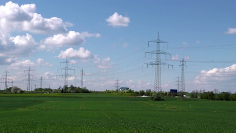 Electric towers passing through agriculture fields