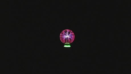 Electricity in the form of lightning in a crystal ball