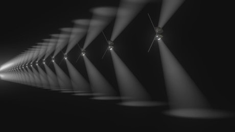 Endless row of 3D light reflectors dancing.
