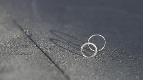 Engagement rings on the ground