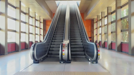 Escalator in airport on a mild day.