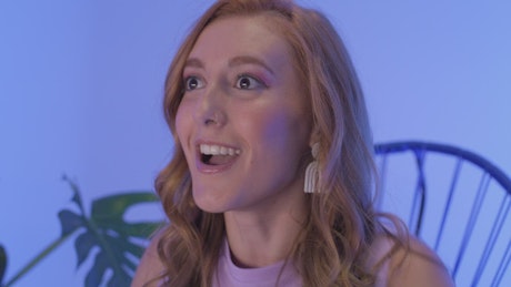 Face of a very surprised young woman.