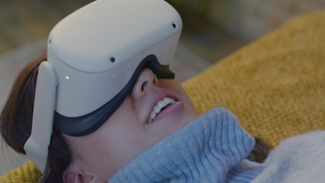 Face of a woman in a virtual reality video call.