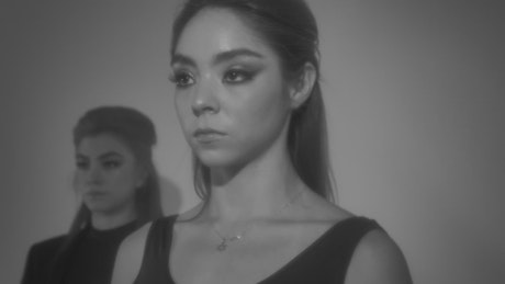 Faces of a pair of dancers during a choreography.