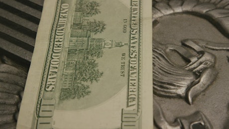 falling $100 Dollar bills close up.