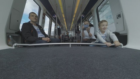 Family on an automated train