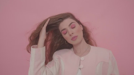 Fashion model on a pink background