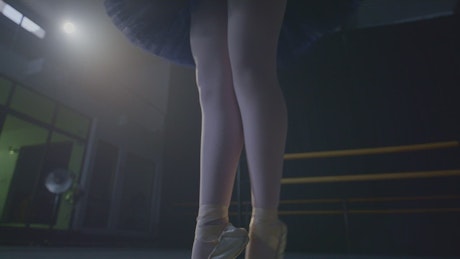 Feet of an expert pointe ballet dancer.