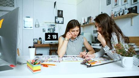 Female architects working at their office