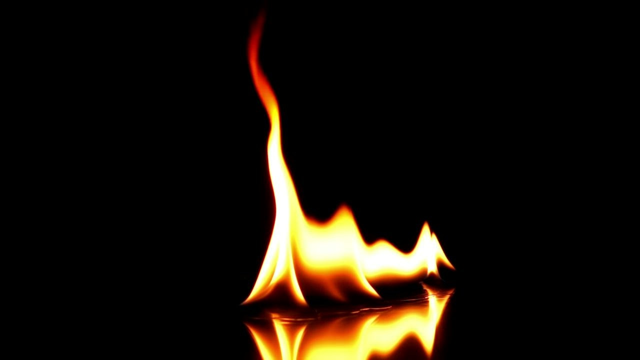 Fire flames on black background - Free Stock Video