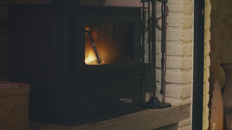Fireplace heater lit inside a house