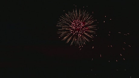 Fireworks flashing in the dark