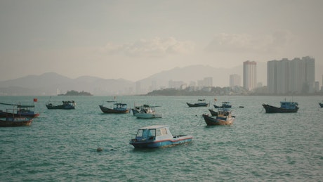 Fishing boats anchored in a harbour in Vietnam.