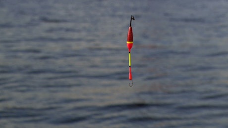 Fishing hook above the water