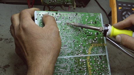 Fixing an old electronic card.