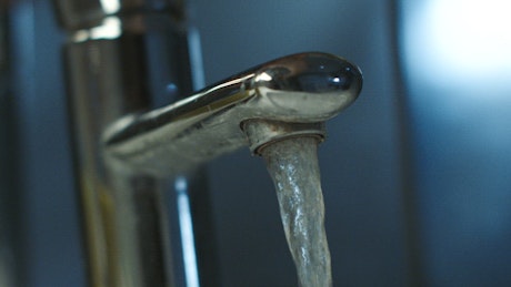 Flowing water from the faucet