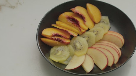 Fruit salad on a plate.