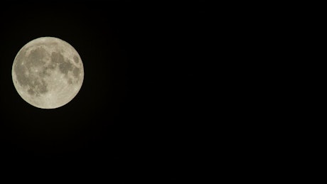 Full Moon heading across the night sky