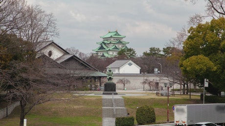 Garden with a statue and Japanese temple