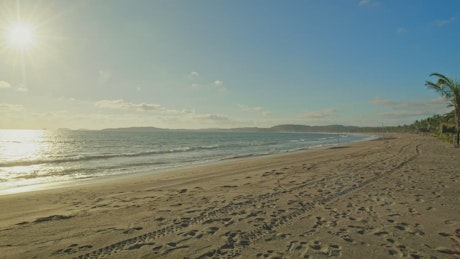 General view of the sea from a sunny beach.