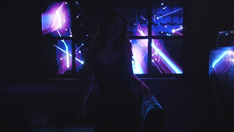 Girl dancing in nightclub.