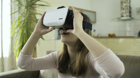 Girl explores virtual reality.