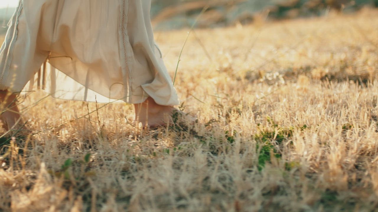 Mixkit Girl Walks Bare Feet In Golden Field At Sunset 47673 4 ?q=80&auto=format%2Ccompress