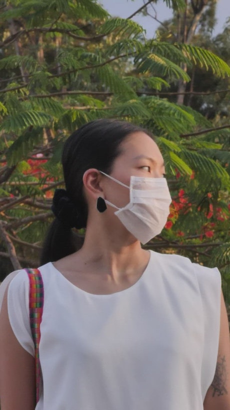 Girl with face mask, portrait.