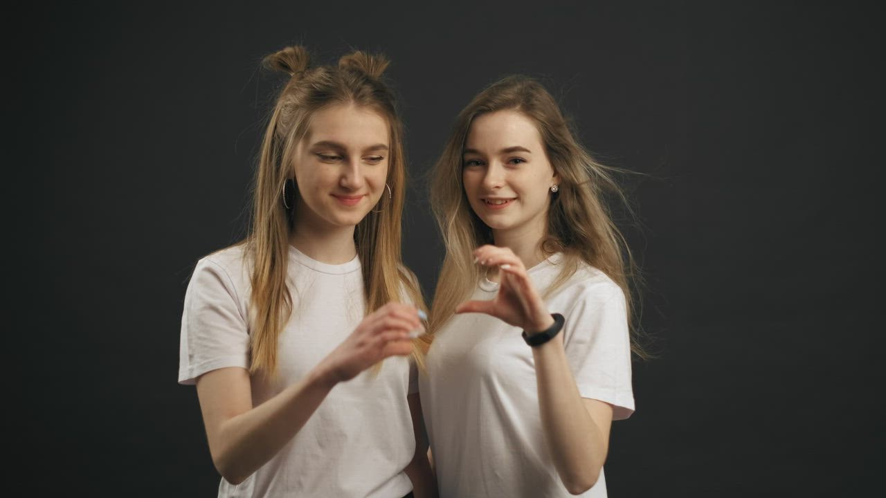 Girls Making A Heart With Their Hands Free Stock Video 