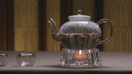 Glass teapot and cups.