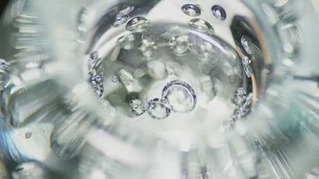 Glass texture with bubbles in motion