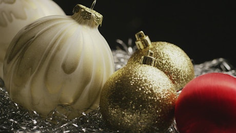 Gold and red Christmas ornaments.