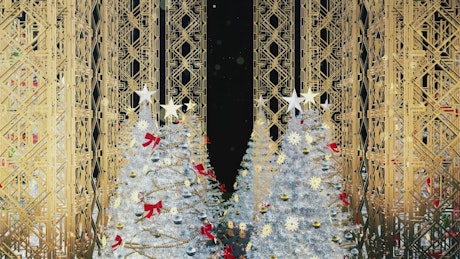 Gold decorations and white Christmas trees.
