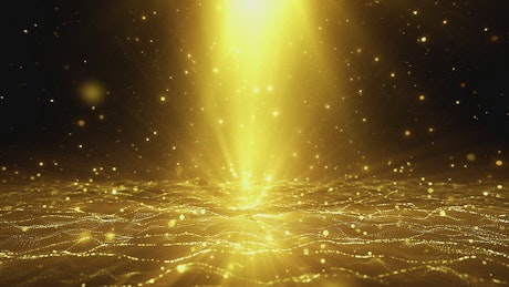 Golden particles rising in a digital world.