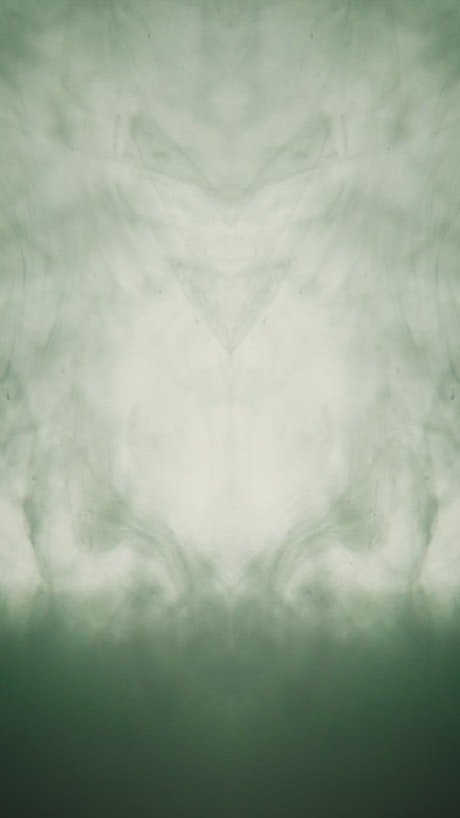 Green ink texture underwater with a mirror in motion
