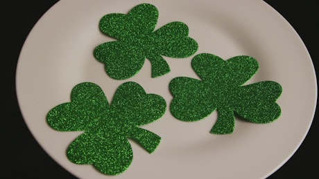Green sparkly three leaf clover decorations.