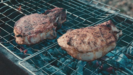 Grilling pork meat with charcoal
