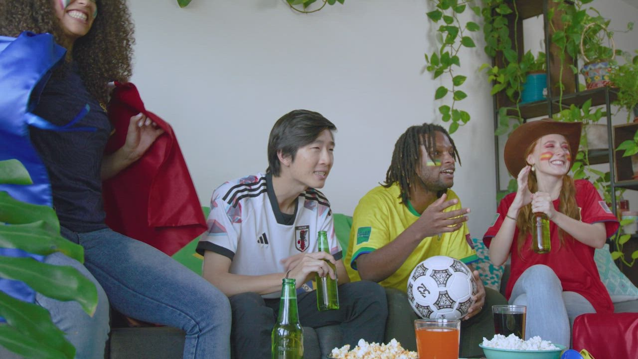 Group of friends watching LIVEDRAW  a World Cup match