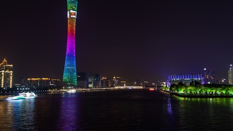 Guangzhou illuminated cityscape and river.
