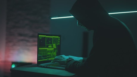 Hacker working at night.