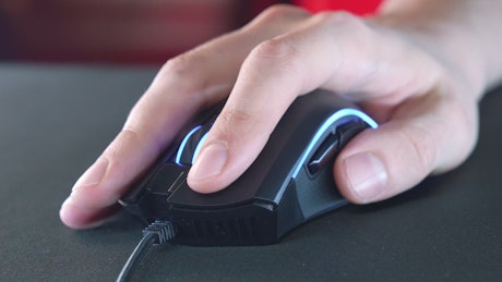 Hand scrolling and moving a gaming mouse