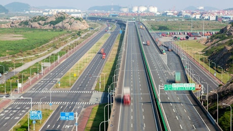 Highway with fast traffic at daytime.