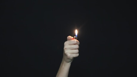 Holding up a lighter