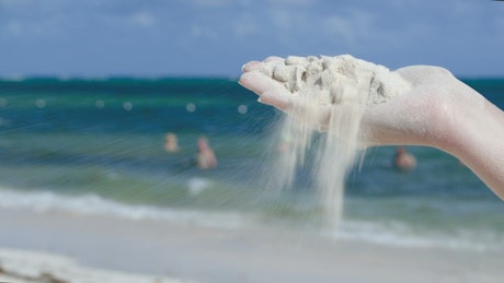 Holding up white sand