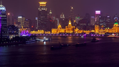 Illuminated buildings in the Shanghai river