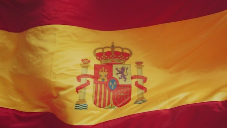 Image of Spanish flag waving.