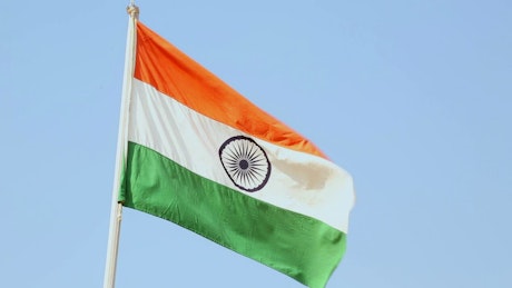 India flag waving in the sky.