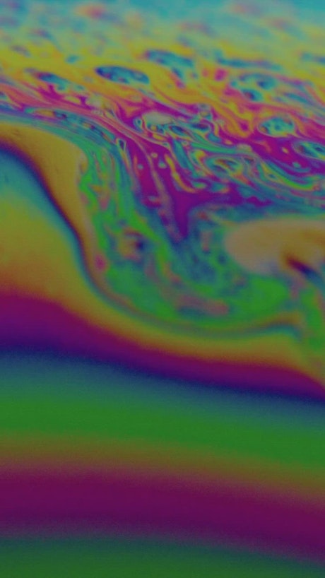 Iridescent colors in a soap bubble.