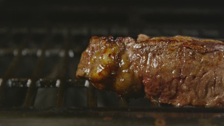 Juicy steak on the grill