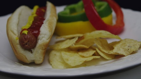 Ketchup and mustard on a hot dog